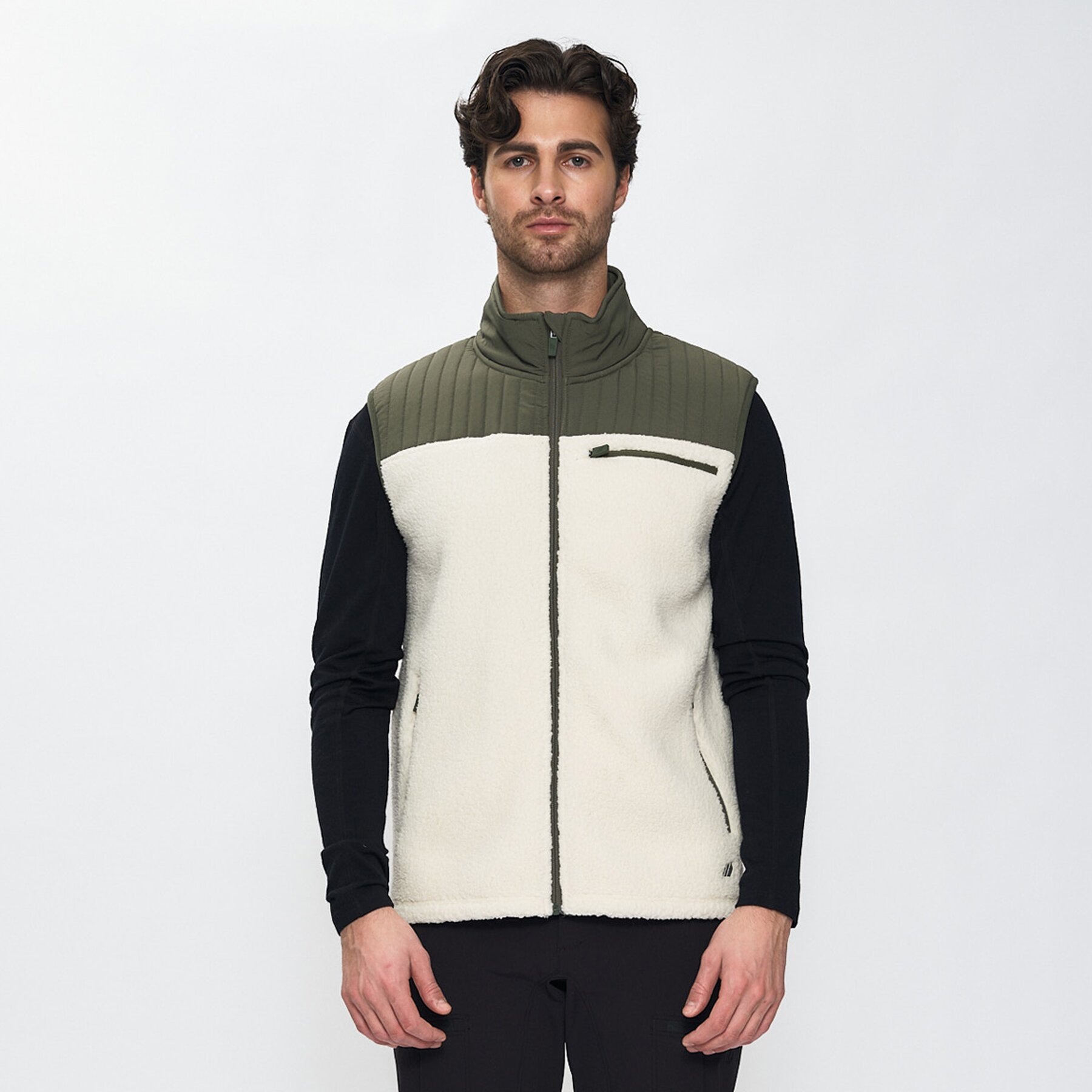 M Torpo, vest
